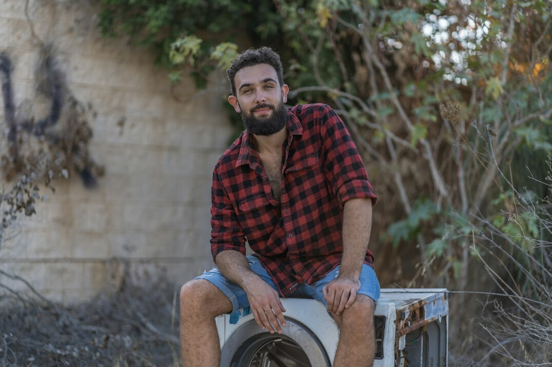 Friendly man with a short beard in a casual shirt